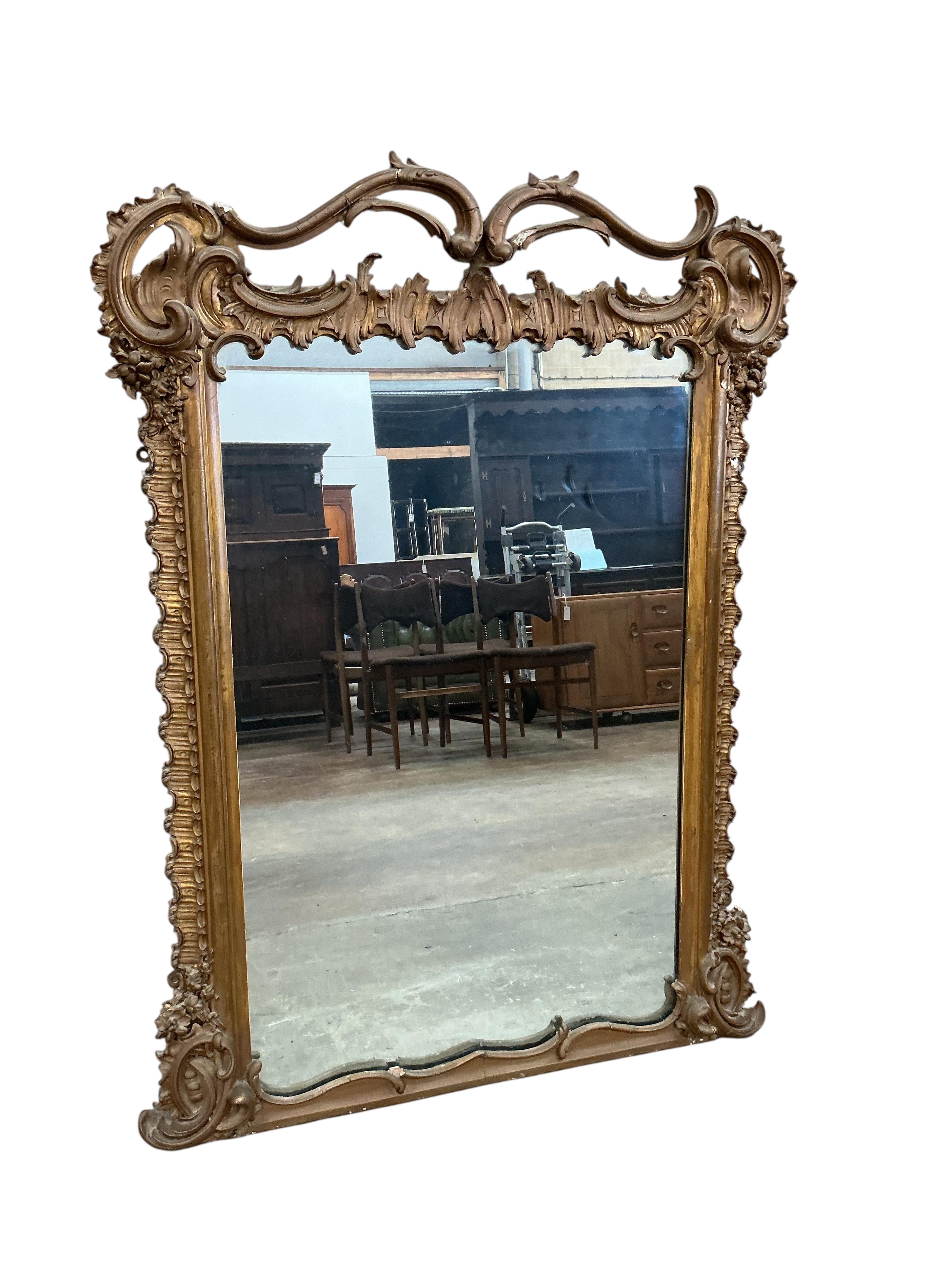 A Victorian giltwood and composition overmantel mirror, width 92cm, height 126cm